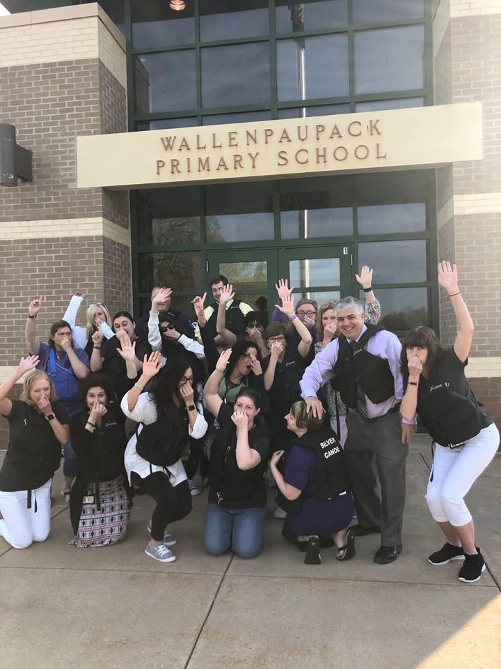 Wallenpaupack Primary School teachers enthusiastically participating in “Wear Your Life Jacket to Work Day” 2019.